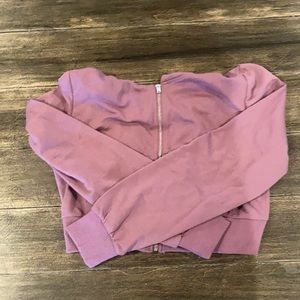 Purple zip up hoodie.